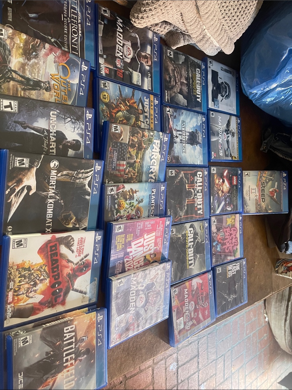 Sony PS4 Game Lot with Blue Case Covers